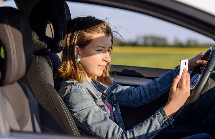 Driving distracted : Survey finds more smartphone use behind the wheel